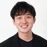 間仁田 賢 氏
